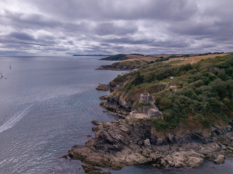 Aerial view of St Catherine s Castle perched on the rocky coastline overlooking the sea near Fowey Cornwall United Kingdom. Aerial view of St Catherine s Castle perched on the rocky coastline overlooking the sea near Fowey Cornwall United Kingdom.