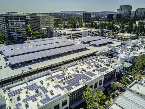 Topanga Canyon United States 06 July 2017 Aerial view of Topanga Village featuring extensive solar panel installations on the rooftops and parking lot structures.