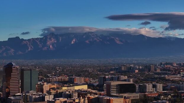 Aerial view of buildings and mountains United States. Aerial view of buildings and mountains United States.