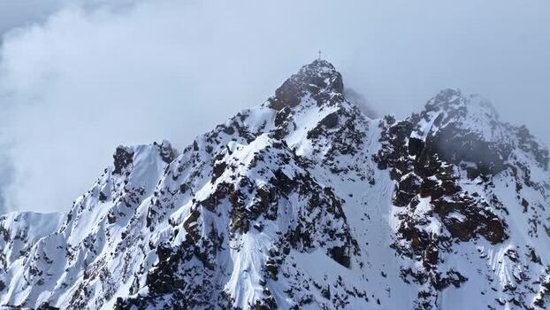 Aerial view of snow covered mountain peak in Nauders Austria.