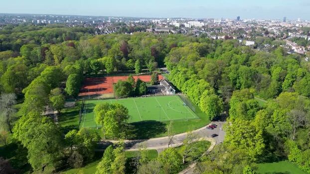 Aerial view of sports fields and tennis courts in a lush park Belgium. Aerial view of sports fields and tennis courts in a lush park Belgium.