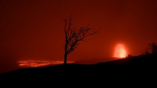 View of Halemaumau Crater with glowing lava at night United States.