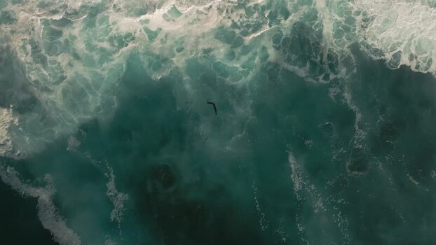 Aerial view of crashing waves at La Jolla Cove United States.