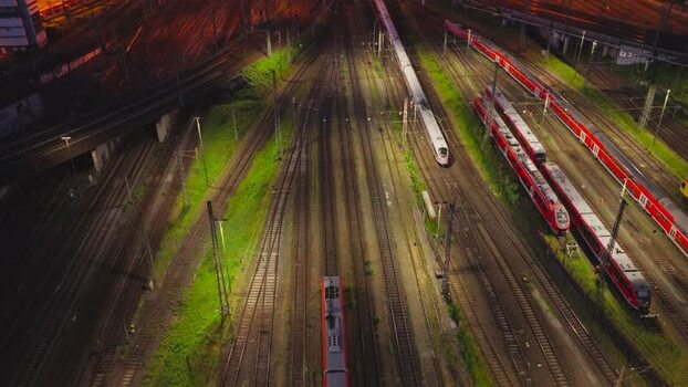 Aerial view of Hauptbahnhof train tracks at night Germany.