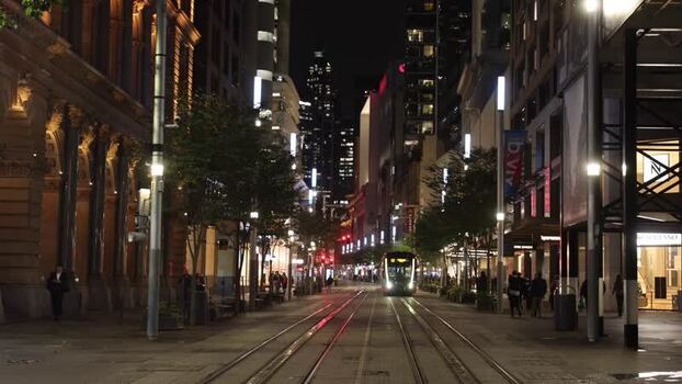 View of the George Street light rail at night in Sydney Australia.