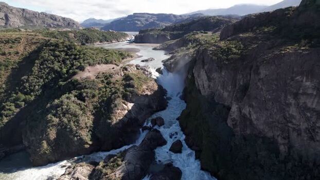 Aerial view of powerful waterfall in a rocky canyon Chile. Aerial view of powerful waterfall in a rocky canyon Chile.