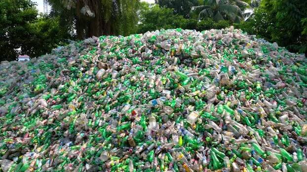 View of a massive pile of plastic bottles in Bogura Bangladesh. View of a massive pile of plastic bottles in Bogura Bangladesh.