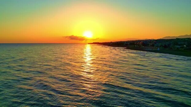 Aerial view of sunset over the coast of Crete Greece.