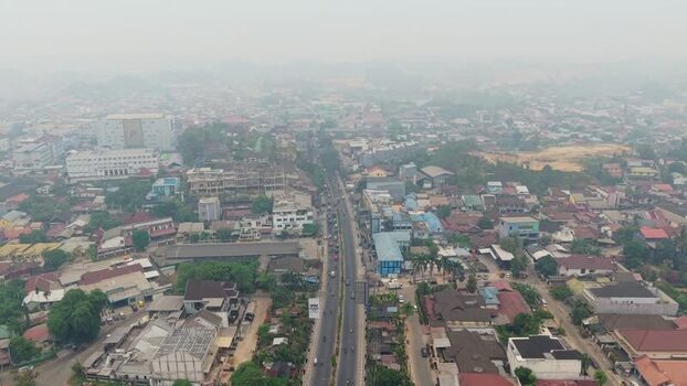 Aerial view of Samarinda city streets and buildings Indonesia.
