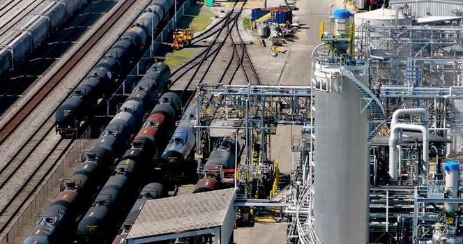 Aerial view of industrial rail yard and tanker cars United States. Aerial view of industrial rail yard and tanker cars United States.