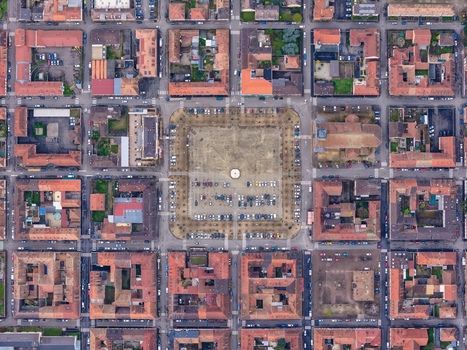 Aerial view of the meticulously planned city layout revealing a central square surrounded by buildings with terracotta roofs Neuf Brisach Grand Est France.