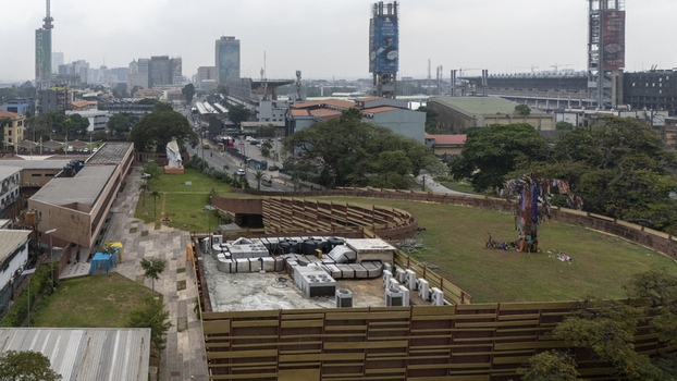Aerial view of Lagos Island featuring urban architecture green spaces and city streets in Lagos Lagos Nigeria. Aerial view of Lagos Island featuring urban architecture green spaces and city streets in Lagos Lagos Nigeria.