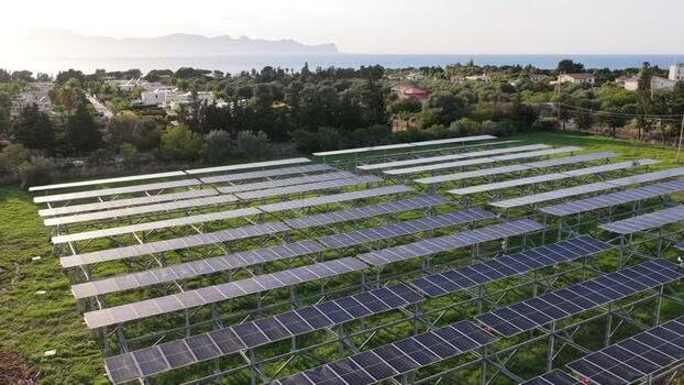 Aerial view of solar panels in a field in Terrasini Italy.