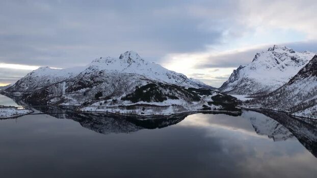 Aerial view of snowy mountains in Lofoten Norway.