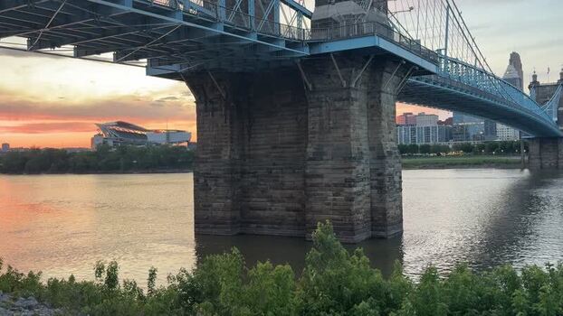 View of John A. Roebling Suspension Bridge at sunset United States.