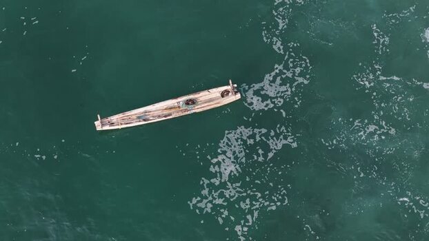 Aerial view of a traditional fishing boat on the sea India. Aerial view of a traditional fishing boat on the sea India.