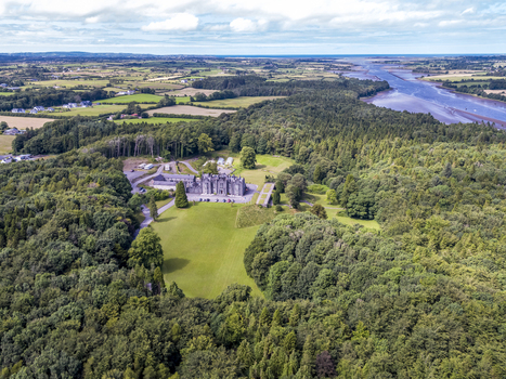 Ballina County Mayo Ireland 25 September 2026 Aerial view of Belleek Castle Hotel set within lush woodlands and green lawns near the River Moy estuary under a bright sky. Ballina County Mayo Ireland 25 September 2026 Aerial view of Belleek Castle Hotel set within lush woodlands and green lawns near the River Moy estuary under a bright sky.