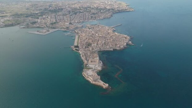 Aerial view of the Island of Ortigia and Maniace Castle Italy. Aerial view of the Island of Ortigia and Maniace Castle Italy.