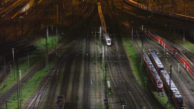 Aerial view of trains at Hauptbahnhof at night Germany.