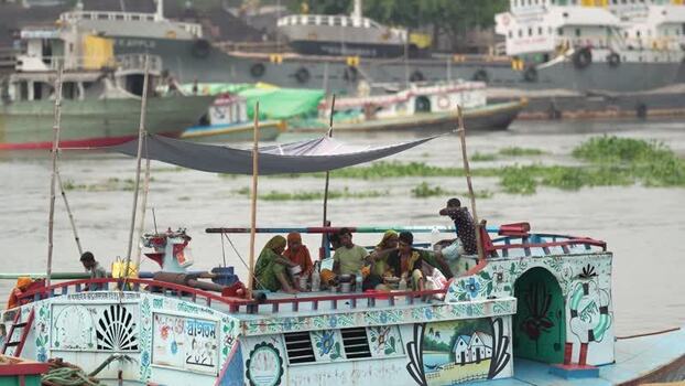 View of people on a decorated boat at Aminbazar Bangladesh. View of people on a decorated boat at Aminbazar Bangladesh.