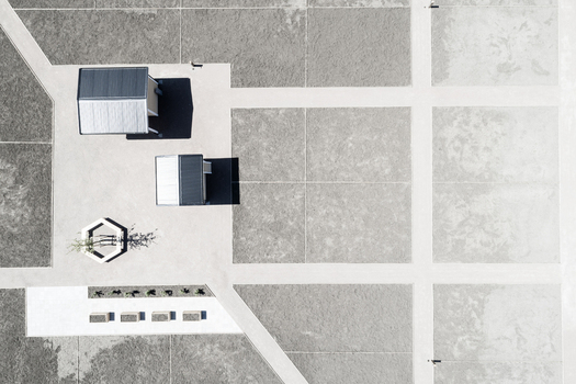 Aerial view of Gardstensberget featuring minimalist geometric paving small modern structures a hexagonal planter and linear benches in Gothenburg Vastra Gotaland County Sweden. Aerial view of Gardstensberget featuring minimalist geometric paving small modern structures a hexagonal planter and linear benches in Gothenburg Vastra Gotaland County Sweden.