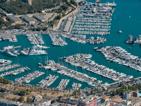Aerial view of Port Vauban marina filled with numerous luxury yachts and sailboats docked in the turquoise waters of the Mediterranean Sea in Antibes Provence Alpes Cote d Azur France. Aerial view of Port Vauban marina filled with numerous luxury yachts and sailboats docked in the turquoise waters of the Mediterranean Sea in Antibes Provence Alpes Cote d Azur France.