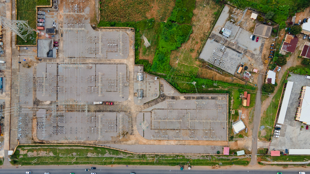 Aerial view of TCN SubStation Katampe featuring electrical transformers power lines and grid infrastructure surrounded by greenery and roads in Abuja Federal Capital Territory Nigeria.