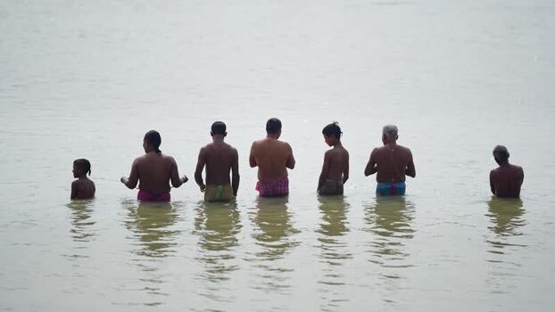 View of people bathing in the river at Godagari Upazila Bangladesh. View of people bathing in the river at Godagari Upazila Bangladesh.