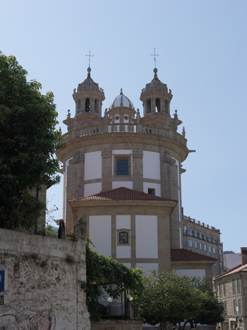 View of Santuario de la Virgen Peregrina with its distinctive dome and twin towers set against a clear blue sky in Pontevedra Pontevedra Spain.