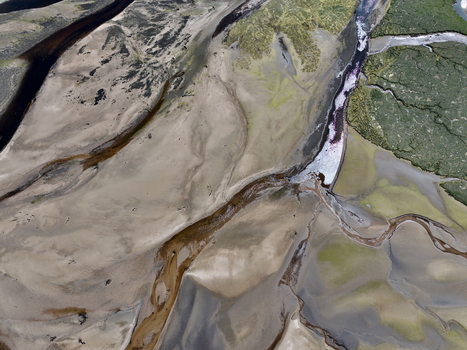 Aerial view of the intricate sandbanks and winding water channels at Findhorn Bay Findhorn Scotland United Kingdom. Aerial view of the intricate sandbanks and winding water channels at Findhorn Bay Findhorn Scotland United Kingdom.