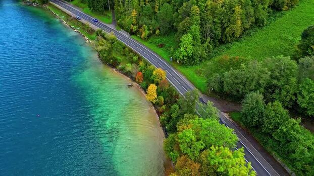 Aerial view of Attersee lake and coastal road Austria.