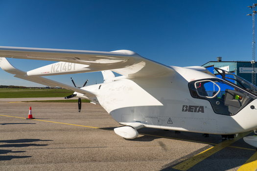 Visby Sweden 07 May 2026 View of the BETA electric aircraft parked on the tarmac at Visby Airport under a clear blue sky.