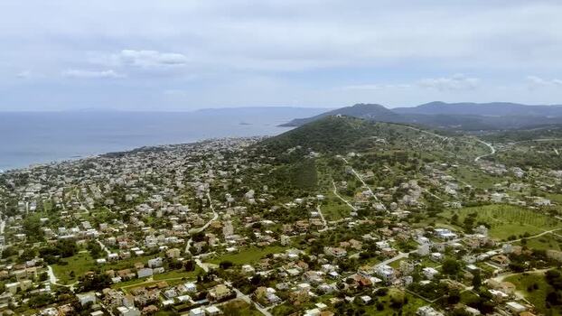Aerial view of houses among hills Greece. Aerial view of houses among hills Greece.