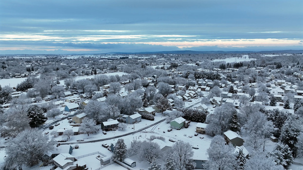 Aerial view of a snow covered suburban neighborhood in Lititz Pennsylvania United States.