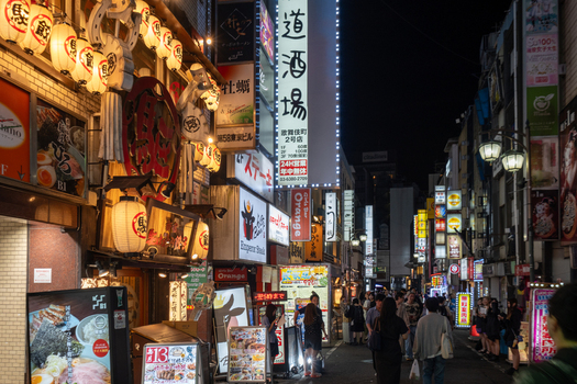 Shinjuku City Japan 30 September 2025 View of vibrant Shinjuku street scene a symphony of illuminated signs and lanterns casting warm glows on strolling pedestrians. Shinjuku City Japan 30 September 2025 View of vibrant Shinjuku street scene a symphony of illuminated signs and lanterns casting warm glows on strolling pedestrians.