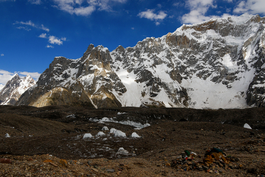 View of Goro II campsite set against the dramatic snow capped peaks and rugged glacial moraine of the Karakoram range in k2 basecamp Gilgit Pakistan. View of Goro II campsite set against the dramatic snow capped peaks and rugged glacial moraine of the Karakoram range in k2 basecamp Gilgit Pakistan.
