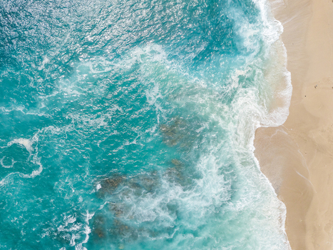 Aerial view of turquise waters of Indian Ocean Reunion island.