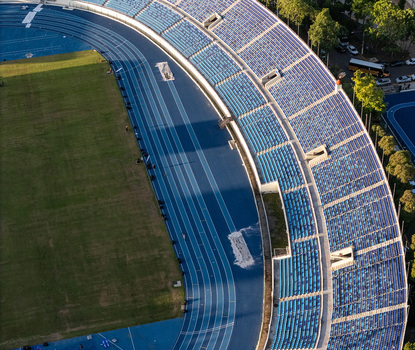 Aerial view of the blue running tracks and stadium seating in Santo Domingo Distrito Nacional Dominican Republic.