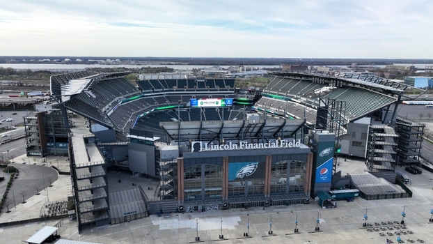 Aerial view of Lincoln Financial Field home of the Philadelphia Eagles stands proudly against the pale sky a modern coliseum of steel and glass Philadelphia Pennsylvania United States.