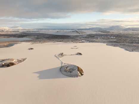 Aerial view of Myvatn lake with volcanic craters and snow covered landscape in Thingeyjarsveit Iceland. Aerial view of Myvatn lake with volcanic craters and snow covered landscape in Thingeyjarsveit Iceland.