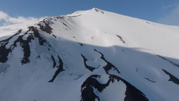 Aerial view of the snow covered peak of Mount Etna Italy. Aerial view of the snow covered peak of Mount Etna Italy.