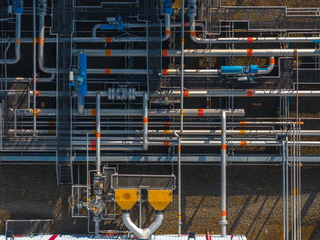 Aerial view of the complex network of industrial pipes and valves at the UGS Damborice facility in Damborice South Moravian Region Czechia. Aerial view of the complex network of industrial pipes and valves at the UGS Damborice facility in Damborice South Moravian Region Czechia.