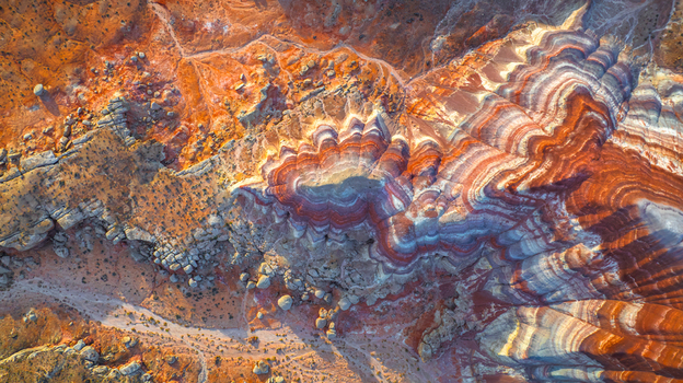 Aerial view of the colorful striped badlands in Hanksville Utah United States.