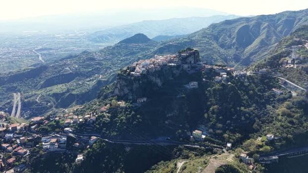 Aerial view of the hilltop village of Castelmola Italy. Aerial view of the hilltop village of Castelmola Italy.
