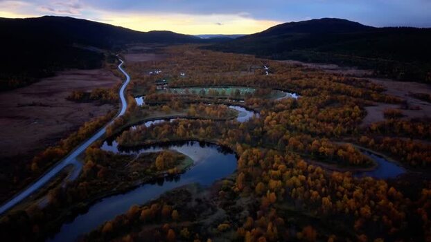 Aerial view of Ljusnan river at sunrise in Funasdalen Sweden.