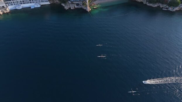 Aerial view of rowers on the sea in Rijeka Croatia.
