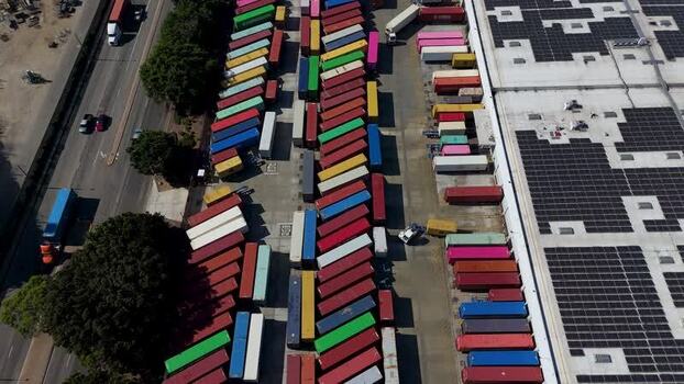 Aerial view of shipping containers in an industrial yard United States.
