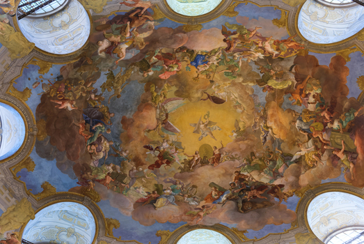 Wien Austria 26 April 2026 View of the ornate Baroque ceiling fresco in the State Hall of the Austrian National Library featuring allegorical figures and golden light. Wien Austria 26 April 2026 View of the ornate Baroque ceiling fresco in the State Hall of the Austrian National Library featuring allegorical figures and golden light.