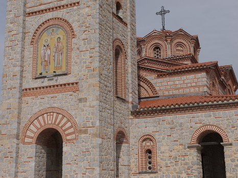 View of the Church of Saints Clement of Ohrid and Panteleimon featuring intricate stone masonry red brick arches and religious icons in Ohrid Municipality of Ohrid North Macedonia. View of the Church of Saints Clement of Ohrid and Panteleimon featuring intricate stone masonry red brick arches and religious icons in Ohrid Municipality of Ohrid North Macedonia.