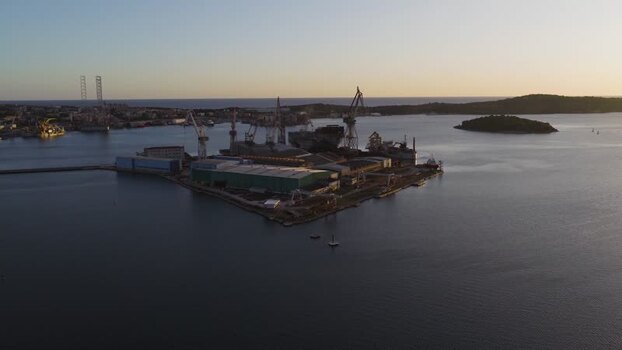 Aerial view of Uljanik shipyard at sunset in Pula Croatia. Aerial view of Uljanik shipyard at sunset in Pula Croatia.